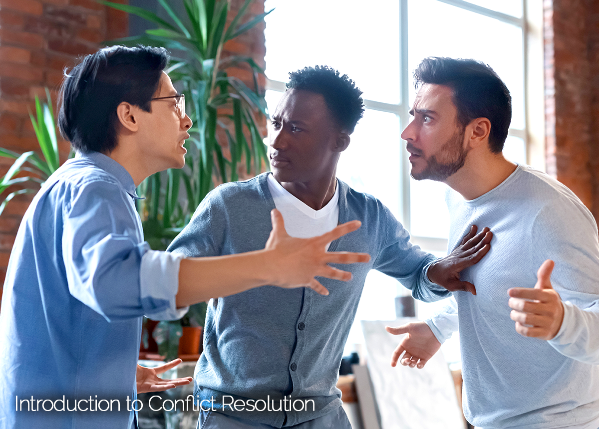 Three coworkers getting into verbal conflict.