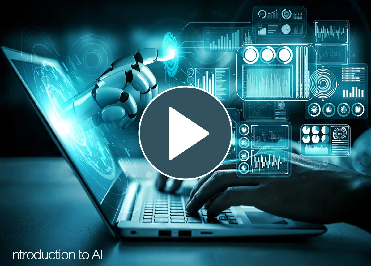 Intro video thumbnail for 'Introduction to AI – A Guide for Office Workers' course, with a robotic hand and human hand interacting over AI data dashboards on a laptop.